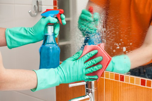 Detailed domestic cleaning in a Chelsea townhouse kitchen