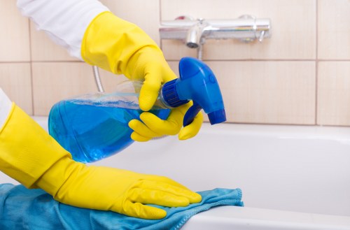 Local carpet cleaner treating stains in a Chelsea flat