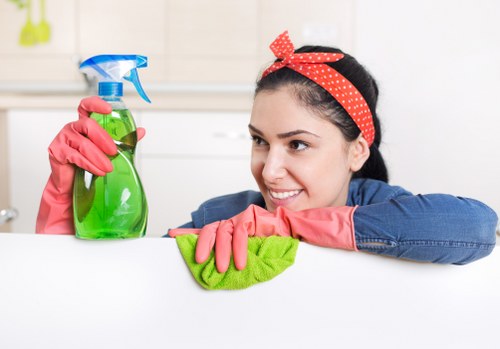 Cleaner preparing a Chelsea flat for final tenancy inspection